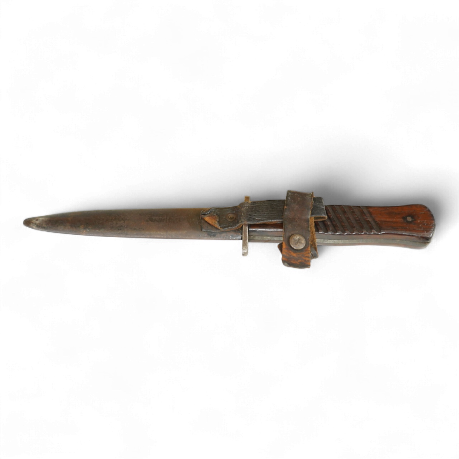 A First World War German Fighting Knife, with two piece wooden grip and steel cross guard, in original steel scabbard with leather belt loop mount, single edged blade with makers mark to one side; Gottlieb Hammesfahr, So